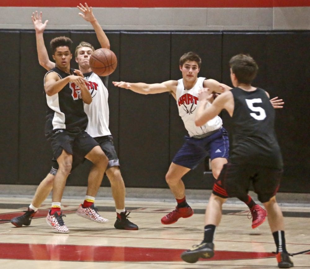 The varsity boys basketball team at Hart scrimmages during a practice on Tuesday. Katharine Lotze/Signal