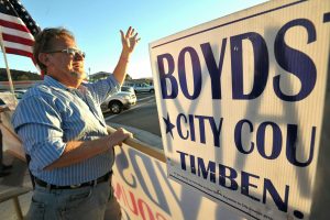 TimBen Boydston waves to motorists as he campigns at the corner of Bouquet Canyon Road and Soledad Canyon Road. Dan Watson/the Signal