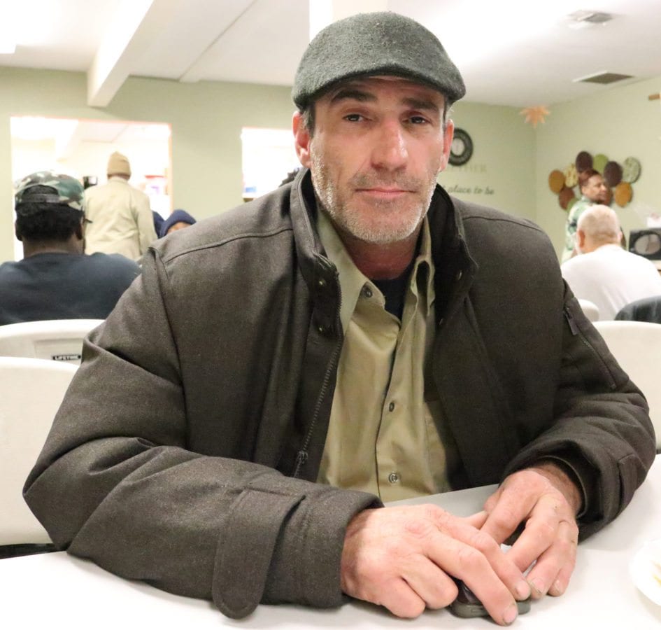 Aaron Bentley sits in Bridge to Home's winter shelter on Drayton Street in Santa Clarita where he is staying for the night on Christmas Eve. Nikolas Samuels/The Signal