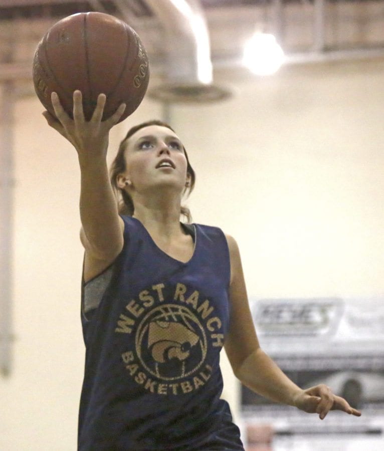 West Ranch's Eleanor McQuillen looks for the lay up during practice on Dec. 8. Katharine Lotze/Signal