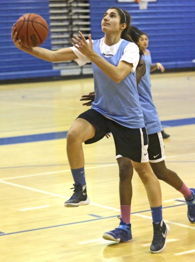 Saugus' Mary Rose Elias goes in for a layup during a practice on Nov. 29. Katharine Lotze/Signal