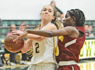 Canyon girls hoops clamps down on Highland