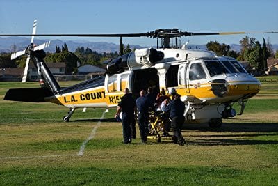 Football player air lifted to hospital after head injury