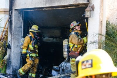 Fire destroys a garage, damages vehicle, at Canyon Country house