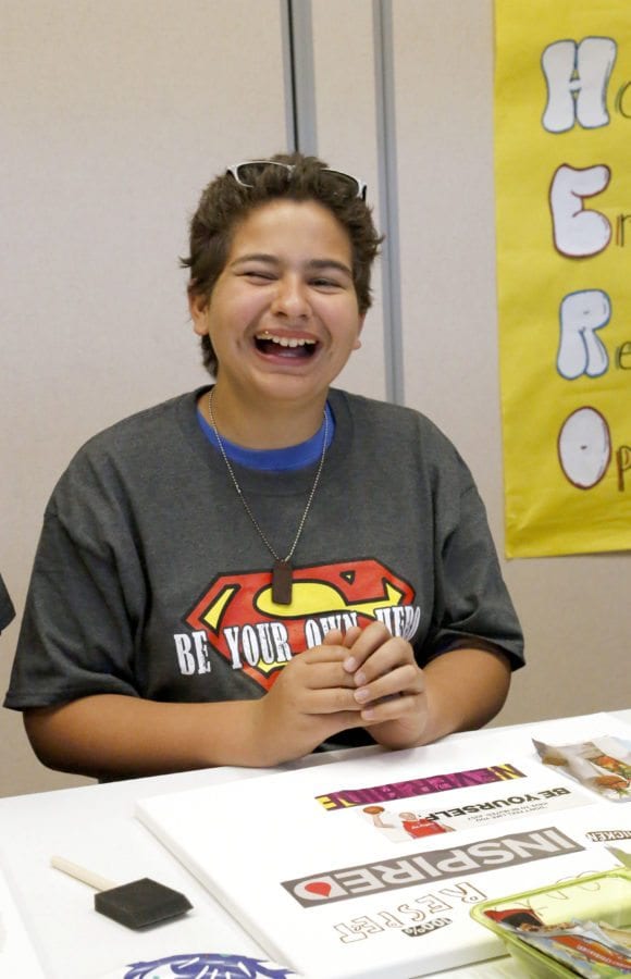 Young men learn to 'be your own hero' during biennial conference