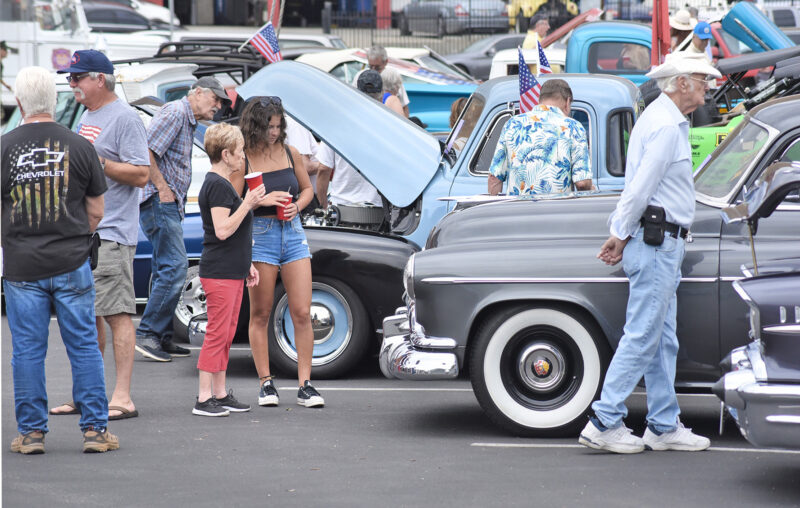 Attendees walk among the 35 cars and motorcyles on display at the Annual Elks Lodge Car and Motorcycle Show held at Santa Clarita Elks Lodge 2379 in Santa Clarita on Saturday, 091022.  