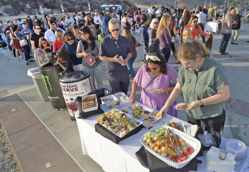 Hundreds of attendees line up at the buffet at the Takeda Science & Lecture Building on the College of the Canyons Canyon Country campus before the Honoring Our New Heroes event on Saturday, 101422.  