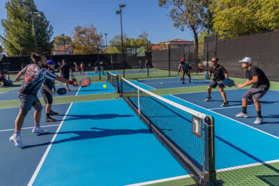 Tournament participants play against each other during the Dink for Cause Pickleball Tournament Fundraiser at the Paseo Club in Valencia, Calif., on Saturday, Nov. 12, 2022.