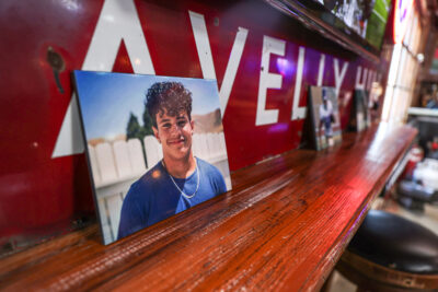 Photos of the late Valencia Vikings football player Pedro “Javi” Roman were placed on tables around the venue during the second annual PJR Day of Remembrance event at Vincent Hill Station in Acton, Calif., on Sunday, Jan. 29, 2023. Roman died of Leukemia in February 2021.