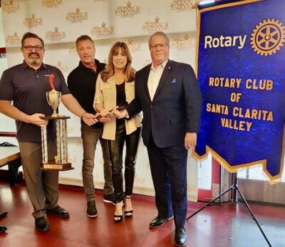 Rotary President-Elect Scott Hoolahan, SCV Charity Chili Cook-Off creators Steve Potrero and Nicole Stinson, and Rotary Past President Steve Corn participated in a “pass the ladle” ceremony on March 1 at the club’s weekly meeting. Courtesy photo.