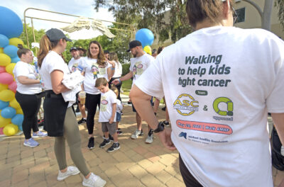 Hundreds of participants gather at the starting line before the Michael Hoefflin Foundation Annual Walk and Pancake Breakfast held at the City of Santa Clarita Activities Center on Saturday, 052023.