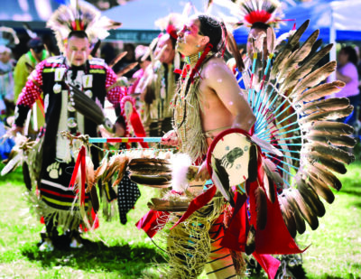 Aaron Ten Bears, in Oglala Lakota regalia carries an eagle dance staff, shield and wears an eagle feather bustle as he dances during the 25th Annual Hart of the West Pow Wow and Native American Craft Fair held at William S. Hart Park in Newhall on Sunday, October 07, 2018. (Photo by Dan Watson)