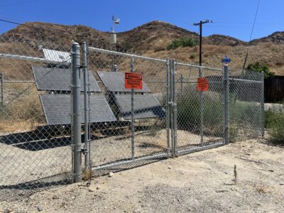 An air-monitoring station at the end of Lincoln Avenue in Val Verde operates on Monday. Perry Smith/ The Signal