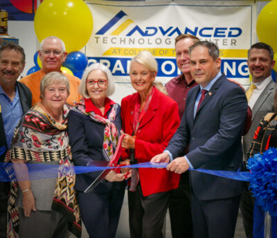 COC Chancellor Dianne Van Hook in red jacket with local dignitaries during the ribbon cutting ceremony for the COC Interim Advanced Technology Center grand opening. Katherine Quezada/ The Signal