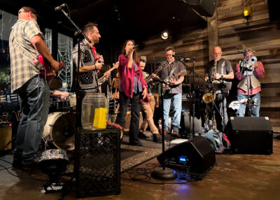 Musicians play original blues music with Kelly Zirbes as the lead singer at the Smokehouse on Main on Thursday night. Katherine Quezada/ The Signal