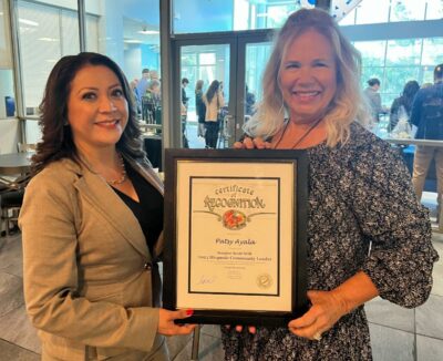 Kris Hough (right), Santa Clarita field representative for Sen. Scott Wilk, presents Patsy Ayala (left) with a California Senate Certificate of Recognition. Courtesy photo.