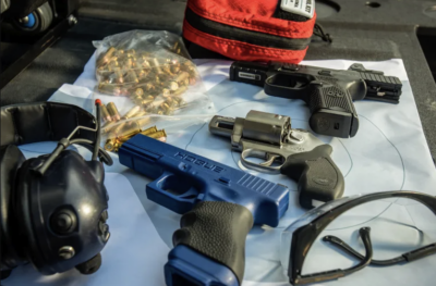 Firearms and ammunition owned and displayed by firearms instructor Ziyad “Zip” Showket on March 15, 2023. Photo by Mark Leong for CalMatters