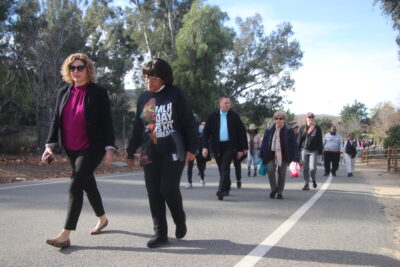 Assemblywoman Pilar Schiavo (left), D-Chatsworth, and Valerie Bradford, president of the Santa Clarita chapter of the NAACP, lead the city of Santa Clarita’s MLK Unity Walk held on Monday at Central Park in Saugus. Tyler Wainfeld/The Signal