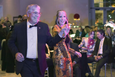 City of Santa Clarita Councilmember Bill Miranda, left, dances with Child and Family Center CEO Nikki Buckstead during the Viva Las Vegas fundraiser for the Child and Family Center held at Sand Canyon Country Club in Santa Clarita on Saturday, 012024. Dan Watson/The Signal