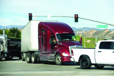 Trucks and vehicles take The Old Road and turn on Magic Mountain to continue onto Interstate 5. Habeba Mostafa/ The Signal