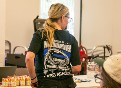 Catie Clinkunbroomer wears a shirt in honor of her brother Deputy Ryan Clinkunbroomer. Katherine Quezada/The Signal