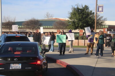 Teachers at Valencia High School demonstrate their displeasure over contract negotiations with the Hart district on Tuesday, Feb. 13, 2024. Teachers across the district participated. Tyler Wainfeld/The Signal.