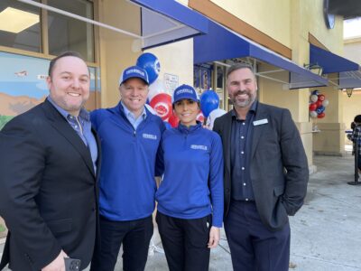 As they celebrate the grand opening of their Handel’s Homemade Ice Cream location, franchisees Scott and Vanessa Sonnenberg are flanked by John Musella (left), chief advocacy officer for the Santa Clarita Valley Chamber of Commerce, and Ivan Volschenk, president and CEO of the chamber. Maureen Daniels/The Signal
