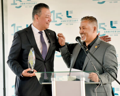 U.S. Senator Alex Padilla, left, joins his friend Adel Villalobos Founder and CEO of Lief Labs at the podium during the 15th Anniversary celebration of Lief Labs in Valencia on Friday, 021624. Dan Watson/The Signal