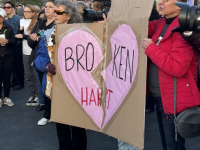 A sign reading "Broken Hart" is held up by Hart District Teachers Association members during a rally to voice displeasure over contract negotiations outside of the Hart district office ahead of Wednesday's governing board meeting. Tyler Wainfeld/The Signal.