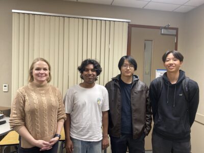 A West Ranch High team was named a national finalist in a math modeling competition. Pictured are (from left) Michelle Diaz-McCormick, a math teacher at West Ranch and the team's school coach, Omkar Guha, Kent Gao and Brandon Chang. Courtesy photo.