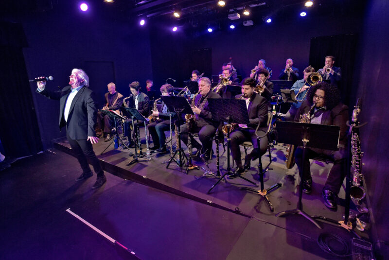 Vocalist Steve Lively, left, joins The Go Jazz Big Band as they perform "All of Me" at The Main in Newhall on Friday, 032824. Dan Watson/The Signal