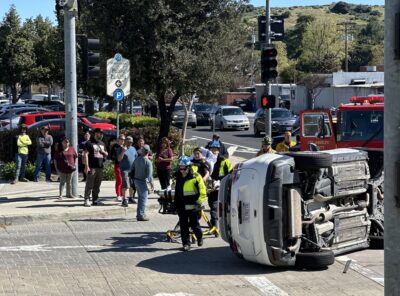 One person was extricated from an SUV on its side on Monday afternoon following a two-vehicle traffic collision in Newhall. Katherine Quezada/The Signal.