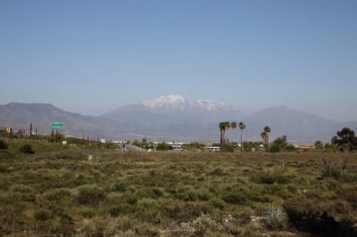 The San Bernardino mountains from Rialto on April 18, 2024. Photo by Zaydee Sanchez for CalMatters