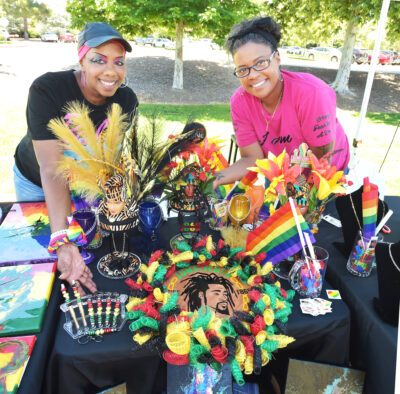 Nicole Callahan, left, and daughter, Okema Maxson display their crafts at their booth during the Juneteenth Celebration presented by NAACP Santa Clarita at Central Park in Saugus on Saturday, 061524. Dan Watson/The Signal