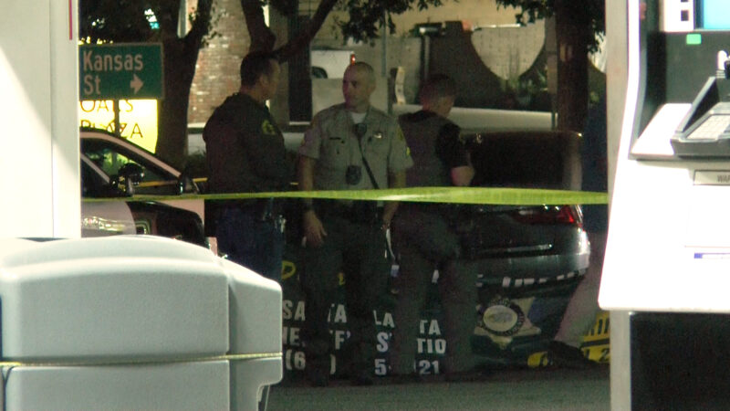 Sheriff's deputies investigate the scene where a person was killed in a shooting Monday night near the intersection of Newhall Avenue and Lyons Avenue. Staff photo