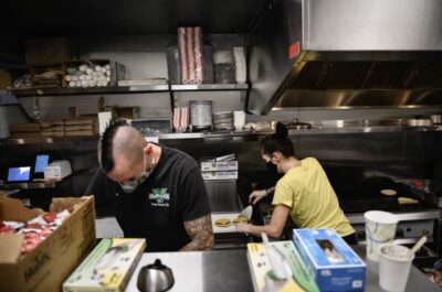 The kitchen at VBurger in Long Beach. Photo by Pablo Unzueta for CalMatters  
