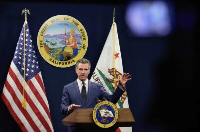 Gov. Gavin Newsom addresses the media during a press conference at the Capitol Annex Swing Space in Sacramento on May 10, 2024. Photo by Fred Greaves for CalMatters