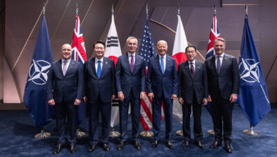 Group photo of leaders at the NATO summit July 11, 2024, from left: Christopher Luxon (prime minister of New Zealand), Suk Yeol Yoon (president of the Republic of Korea), NATO Secretary General Jens Stoltenberg, U.S. President Joe Biden, Fumio Kishida (prime minister of Japan), Richard Marles (deputy prime minister of Australia). Photo courtesy of NATO.