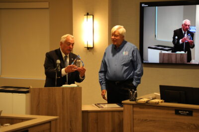 From left, SCV Water board President Gary Martin presents board member Ed Colley with a recognition for his service. Courtesy photo