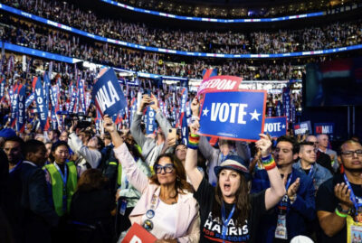 Delegates listen to former President Barack Obama speak during the second day of the Democratic National Convention at the United Center in Chicago on Aug. 20, 2024. Photo by Madalina Vasiliu.