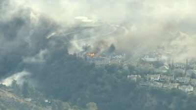 This aerial view from the ABC7 helicopter shows homes burning in the Eaton Fire in Altadena on Wednesday morning, Jan. 8, 2025. Screenshot courtesy of ABC7.
