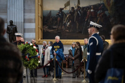 Members of the public pay respects to the flag-draped casket of former President Jimmy Carter in the U.S. Capitol Rotunda in Washington on Jan. 8, 2025. Photo by Madalina Vasiliu.