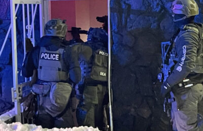A photo released by the Drug Enforcement Agency (DEA) on Jan. 26, 2025, shows officials raiding an area near Denver, Colorado, targeting a Venezuelan gang. DEA Rocky Mountain/X