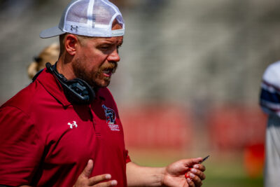 New Trinity Classical Academy head football coach Dave Eastham during a game against Monroe last season when he was an assistant coach. Photo courtesy of Trinity Athletics.
