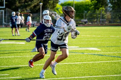 Hudson Hargraves (99) of West Ranch runs with the ball against Martin Luther King during the CIF Southern Section Division 3 semifinals on May 10, 2025 in Valencia, Calif. Katherine Quezada/The Signal