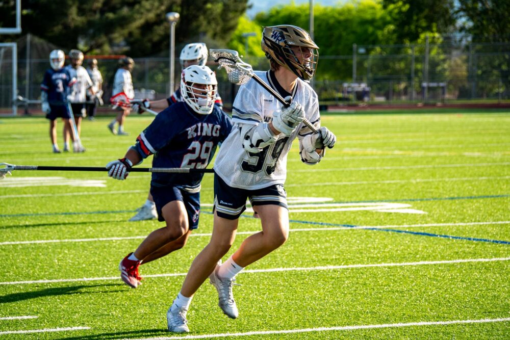 Hudson Hargraves (99) of West Ranch runs with the ball against Martin Luther King during the CIF Southern Section Division 3 semifinals on May 10, 2025 in Valencia, Calif. Katherine Quezada/The Signal