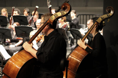 Double bassists Eric Alehouse and Daesul Christina Lee play at "The Romantic Symphony" at Canyon High School Performing Arts Center, Saturday, May 10, 2025. Kamryn Martell/The Signal