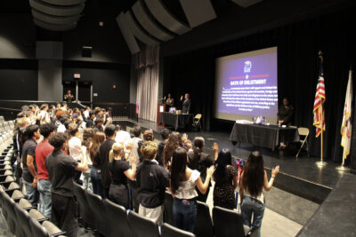 Enlisting students take the Oath of Enlistment at the Our Community Salutes of Santa Clarita and Kiwanis Club of Santa Clarita ceremony at Golden Valley High School in Canyon Country, Saturday, May 17, 2025. Kamryn Martell/The Signal
