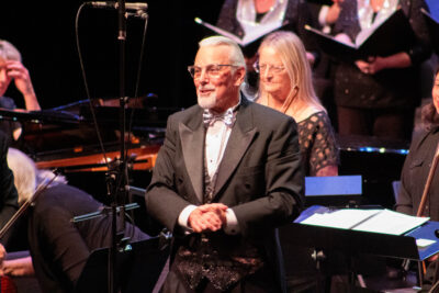 Artistic Director Allan Robert Petker conducts the Santa Clarita Master Chorale at its grand finale, "Silver Celebration," for its 25th anniversary season at the Santa Clarita Performing Arts Center in Valencia on Sunday evening, June 8, 2025. Maya Morales/The Signal