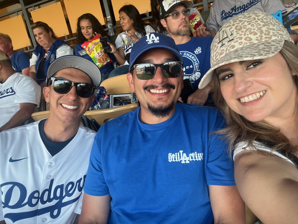Ed Solis, Robert Cruz and Maddy Gonzalez were among the Santa Clarita employees, friends and community members who attended Santa Clarita Dodger Day on Saturday, June 21, at Dodger Stadium. Courtesy photo.